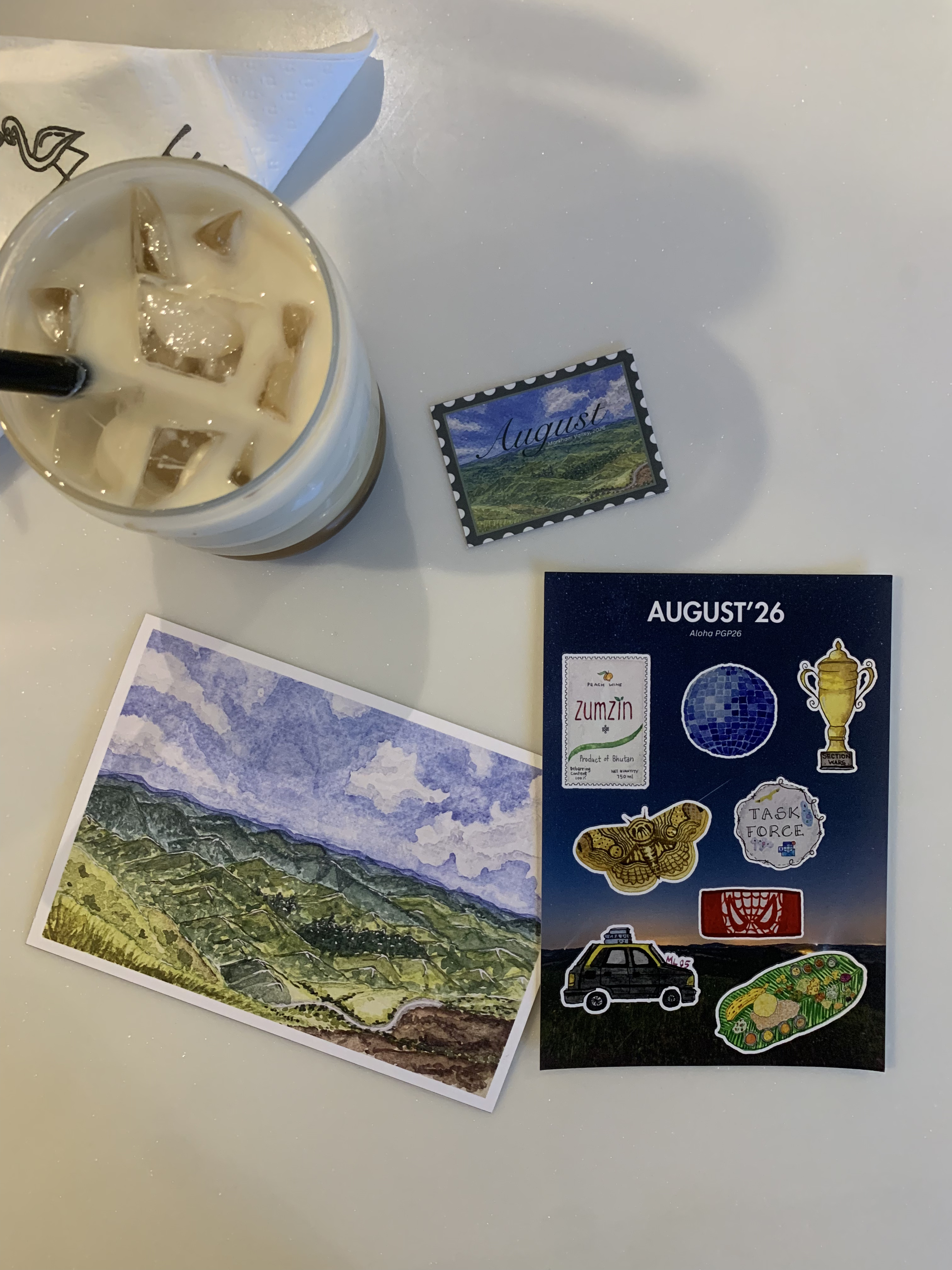 Postcards laid out on a desk